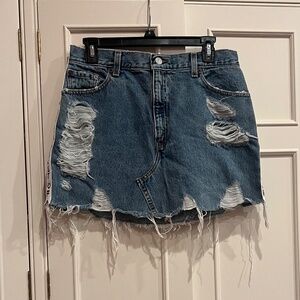 New without tags:: First of a Kind distressed denim mini skirt, Size 26